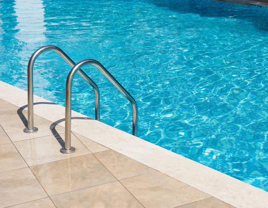 Swimming pool with water and a stair